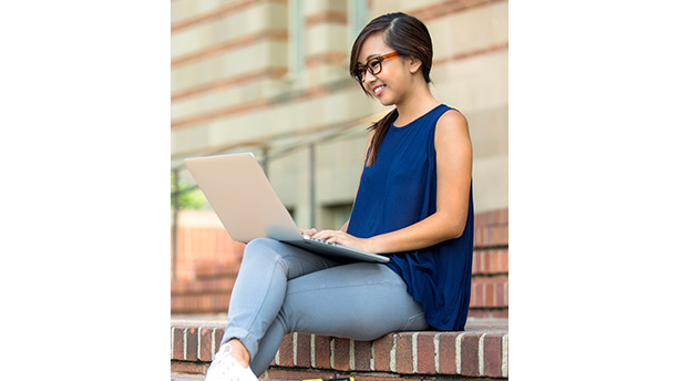 student using laptop