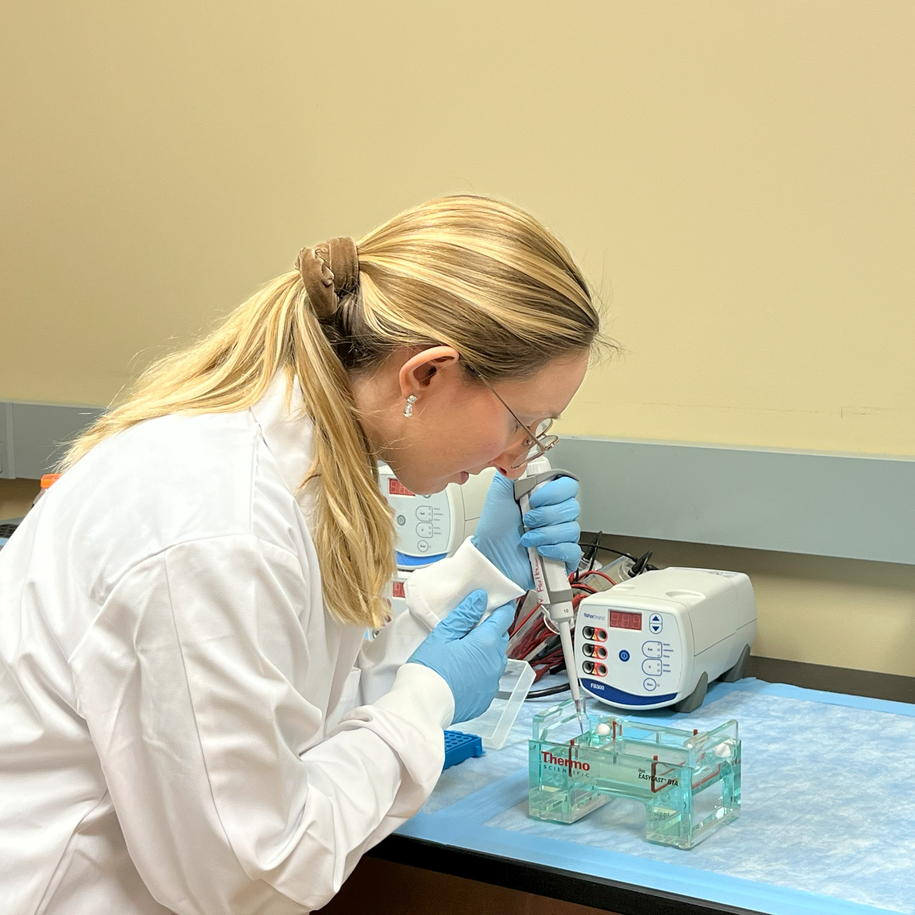 a student using a pipette