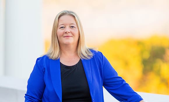 Dr. Stacy Anderson with a blue shirt.
