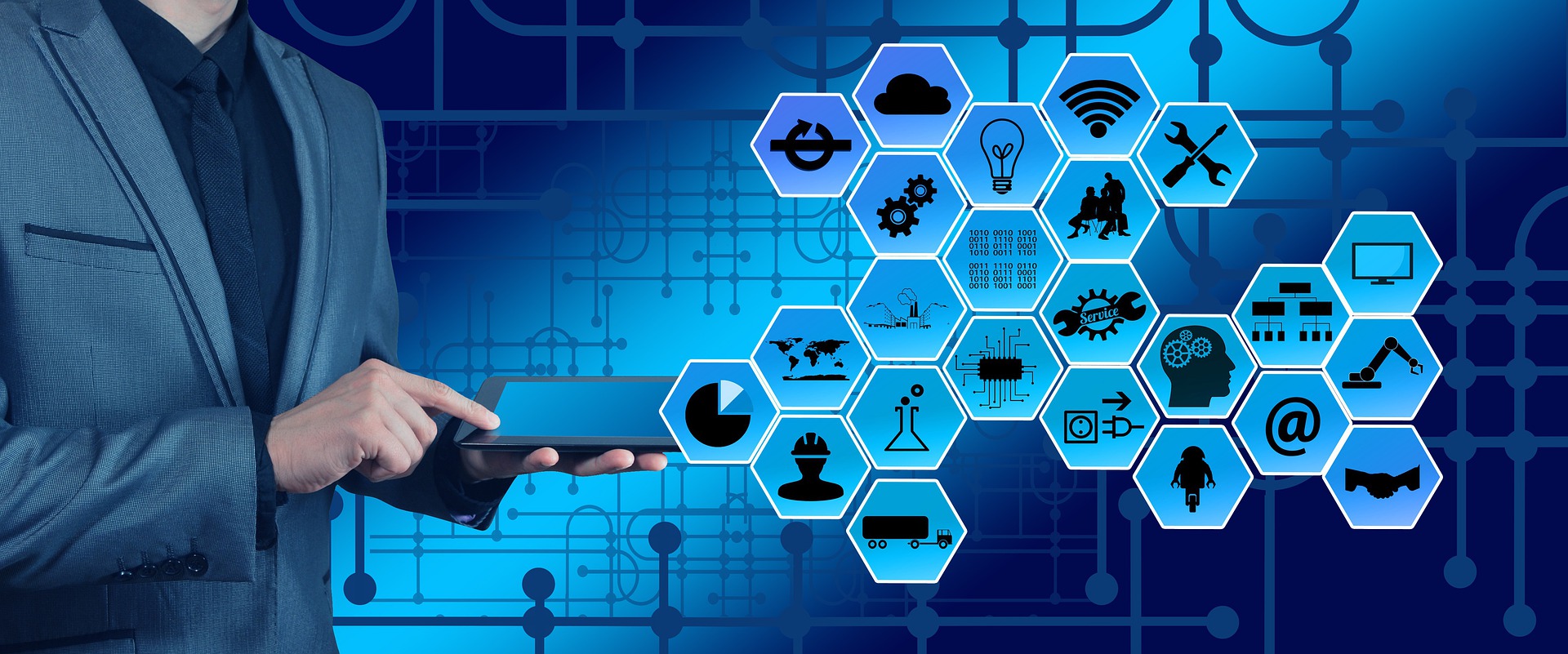 Man holding a tablet with technology images