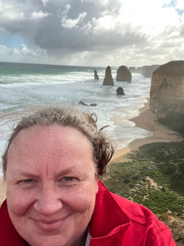 Dr. Hotzman visiting the 12 Apostles rock formation while in Australia
