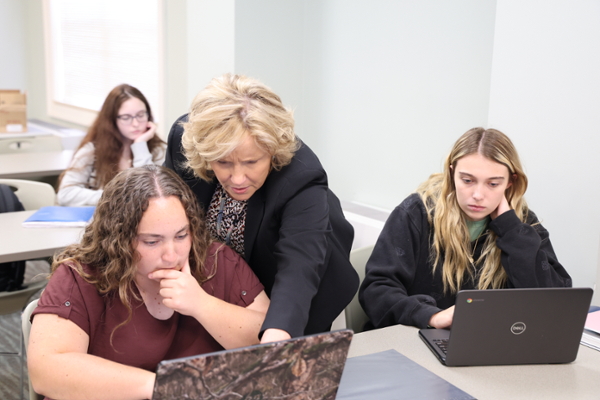 LMU file photo of teacher with students