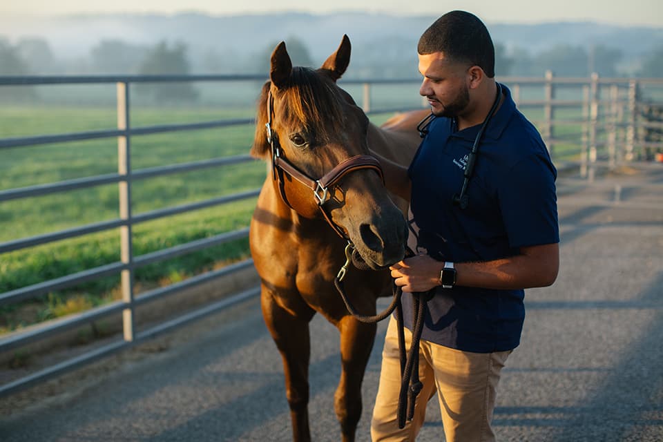 student with horse