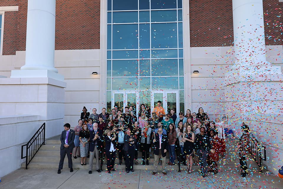 SAVMA celebration group photo and confetti