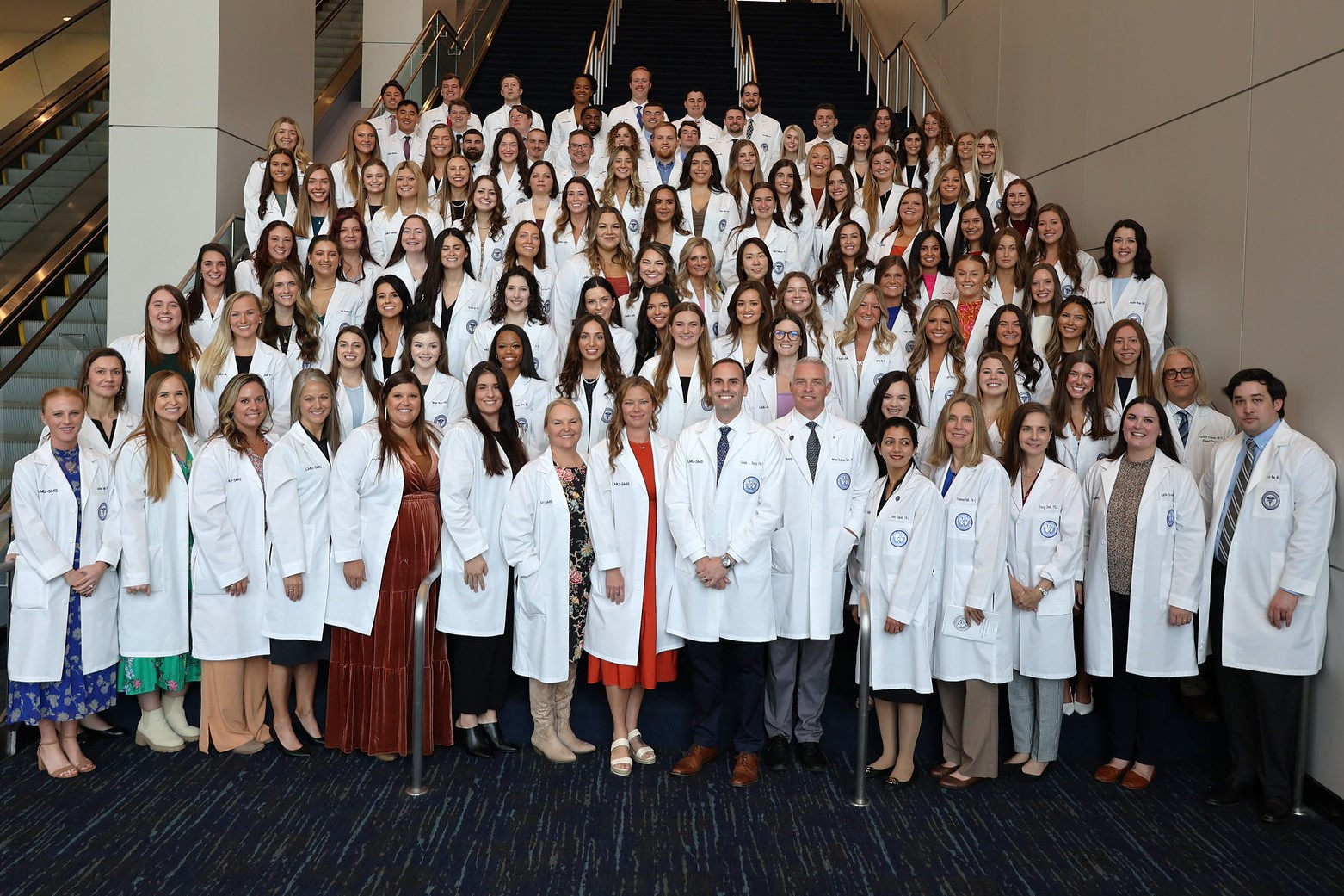 white coat group photo