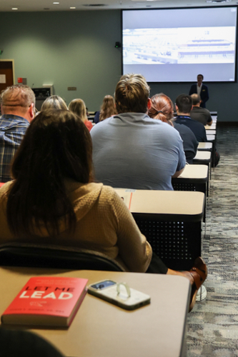Dr. Seger Morris speaking to LMU faculty, staff and students