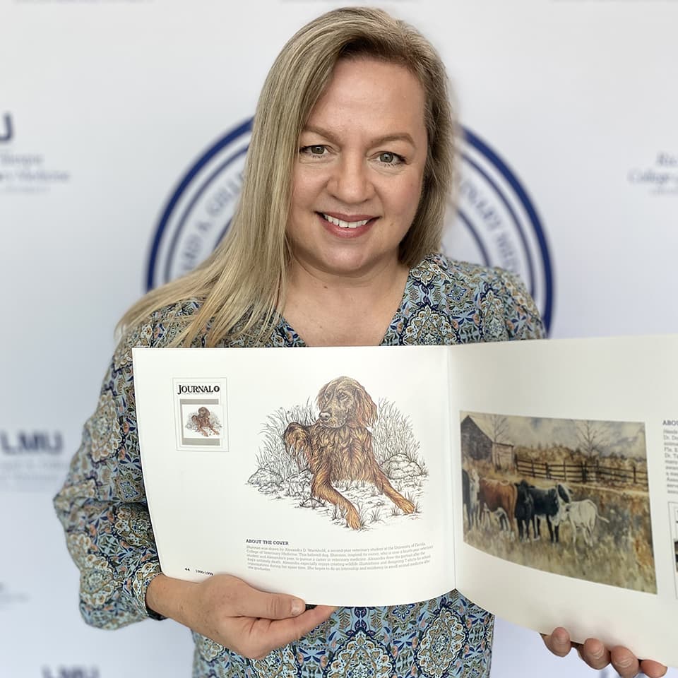 Headshot of Gilley holding book