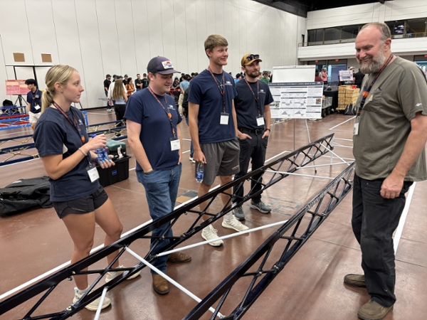 Engineering students at the AISC Steel Bridge Competition