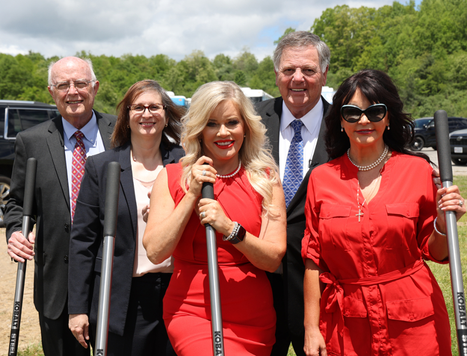 LMU-CDM and Health Wagon members pose for a picture during the ground breaking event