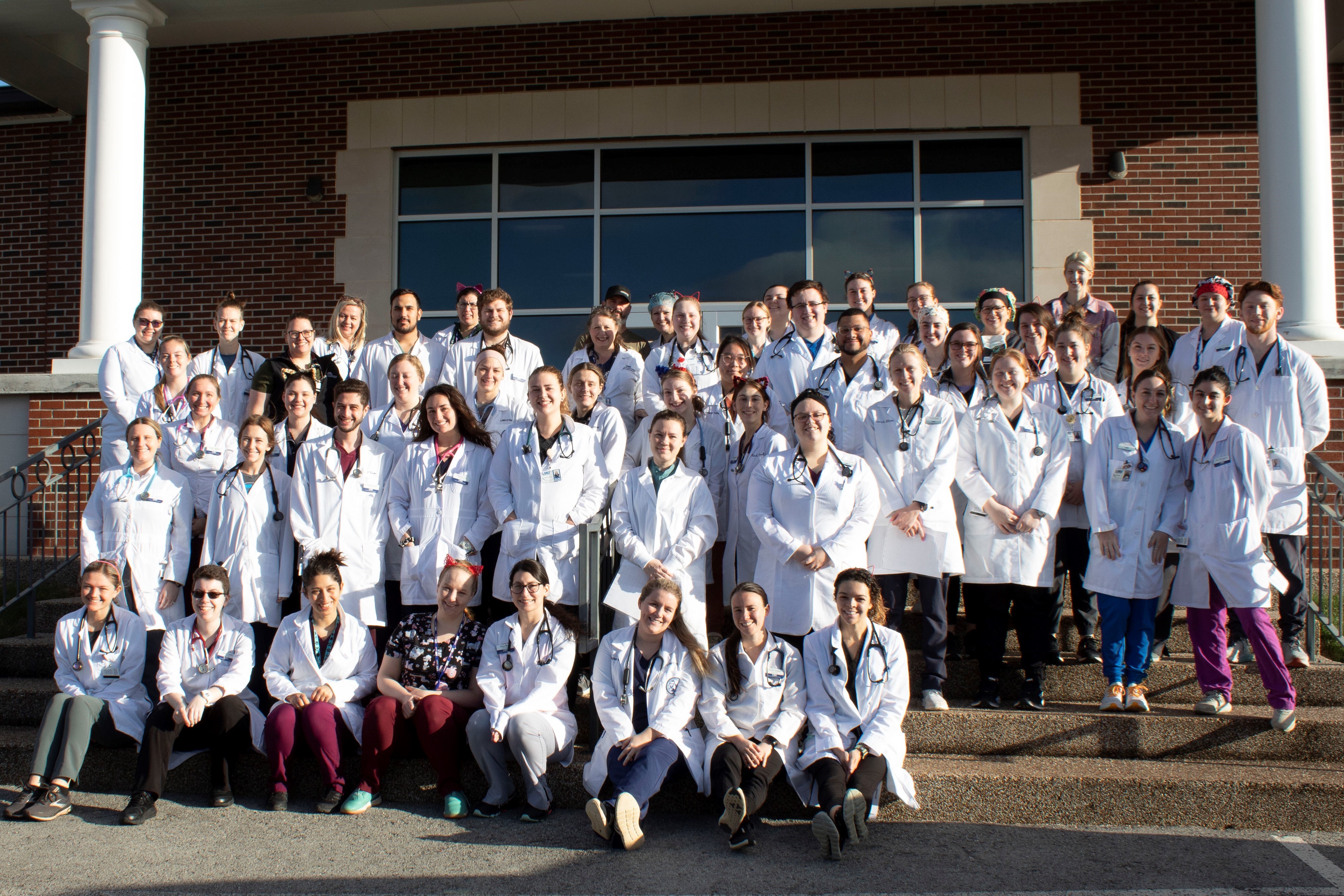 student and faculty group photo at the event