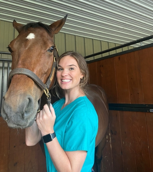 Morgan Simpson with a horse.