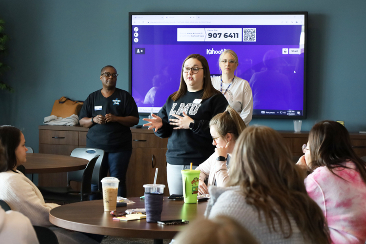 LMU social work major Brooklyn Bowen speaks to group.