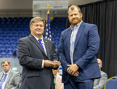 Dr. Hess inducts Buck Turner into the LMU Literary Hall of Fame