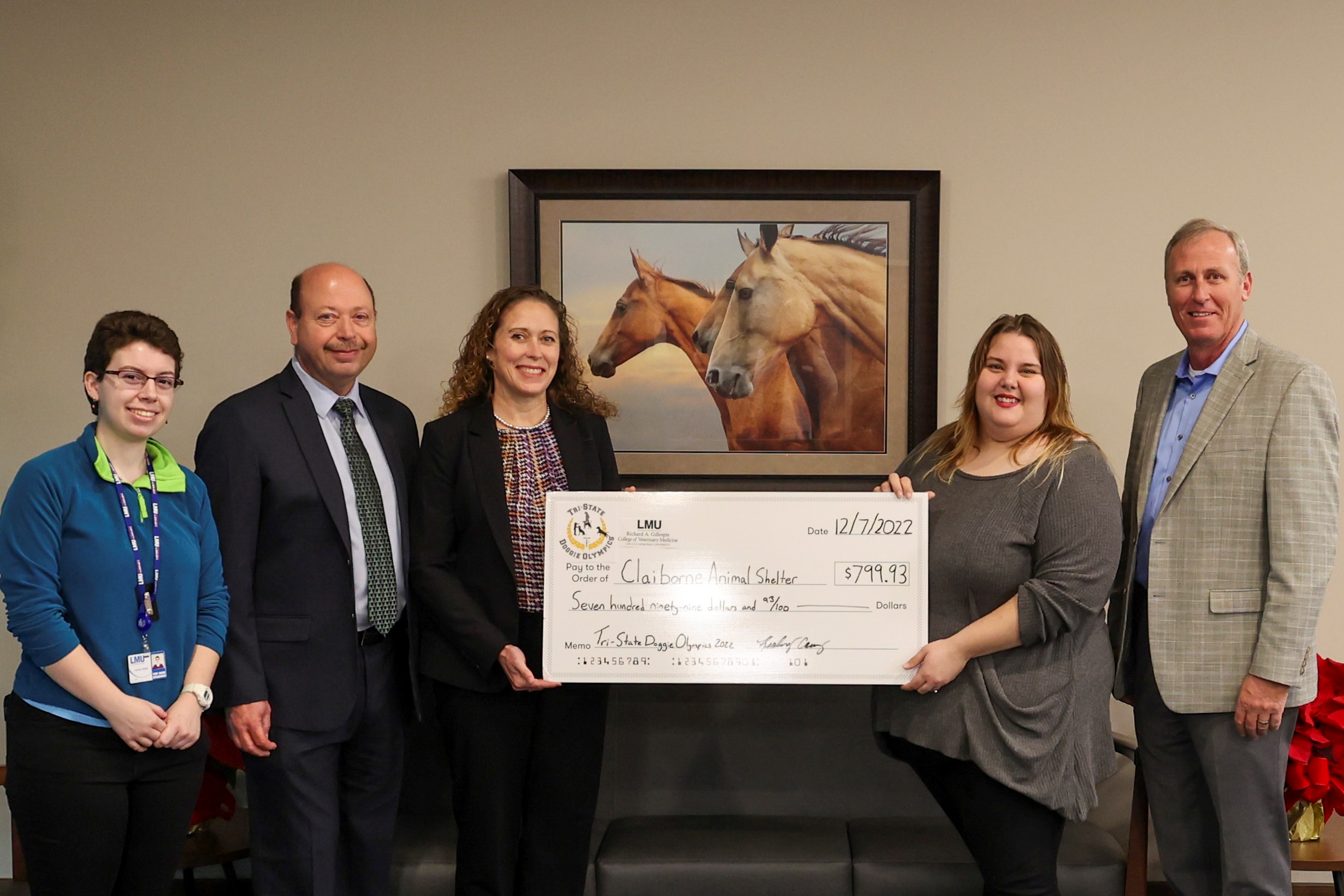 check presentation to Claiborne Animal Shelter