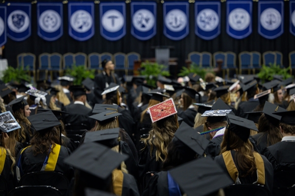 Hat shot of seated graduates