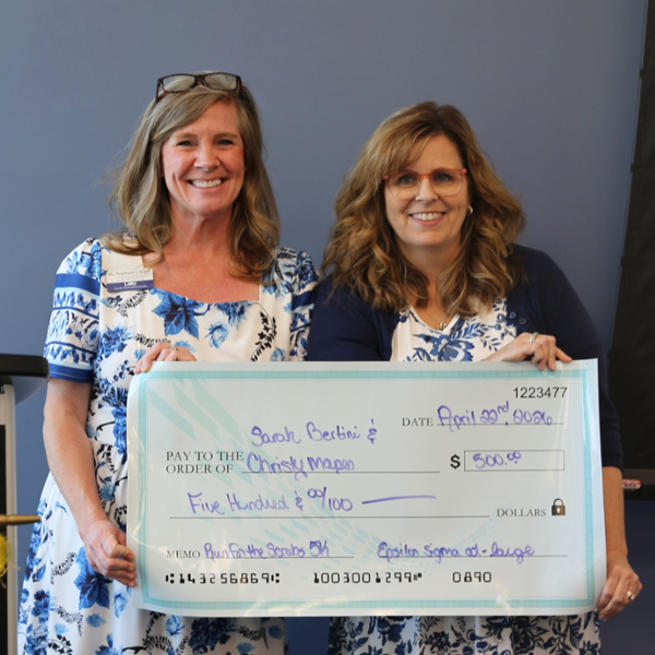 Conder presenting check to Mapes