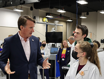 Gov. Glenn Youngkin, Michael Foget and Nicole Mauro