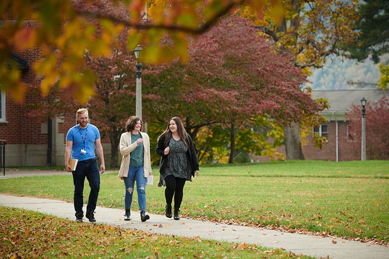 Students walking in front of academic building