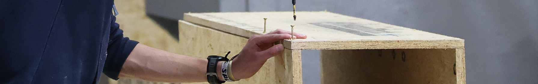 Engineers looking at a blueprint on a table