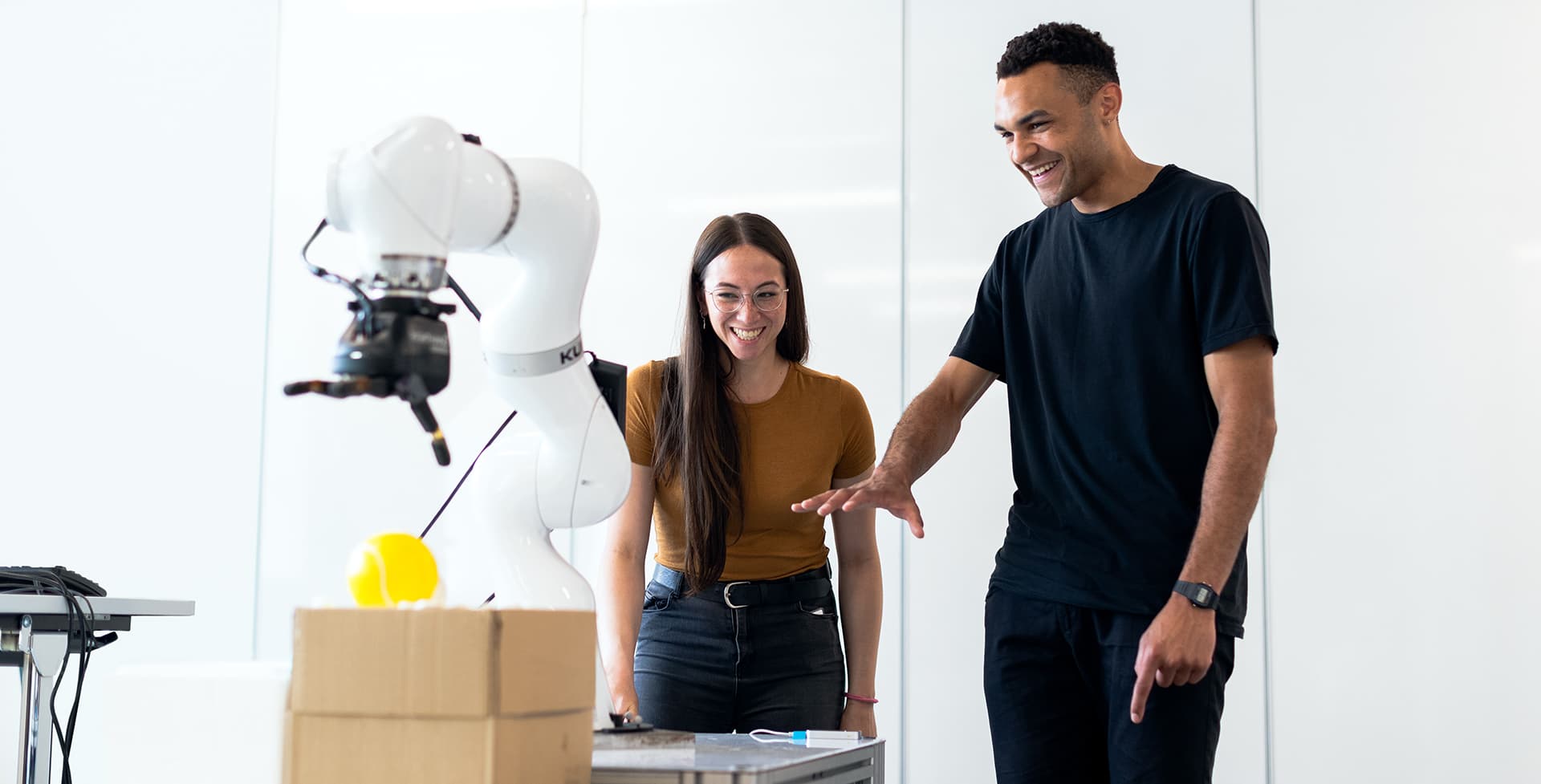 Students looking at machine