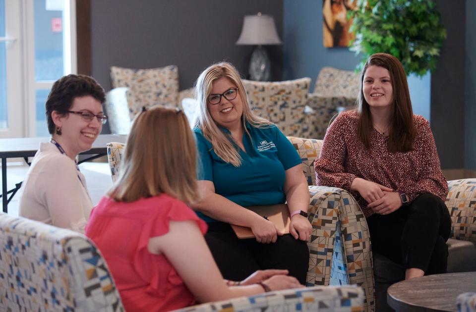 A group of women talking.