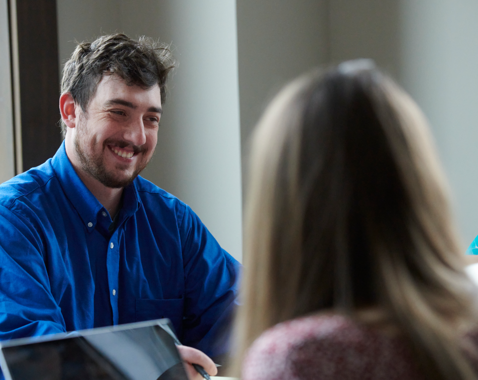 A picture of a student smiling.